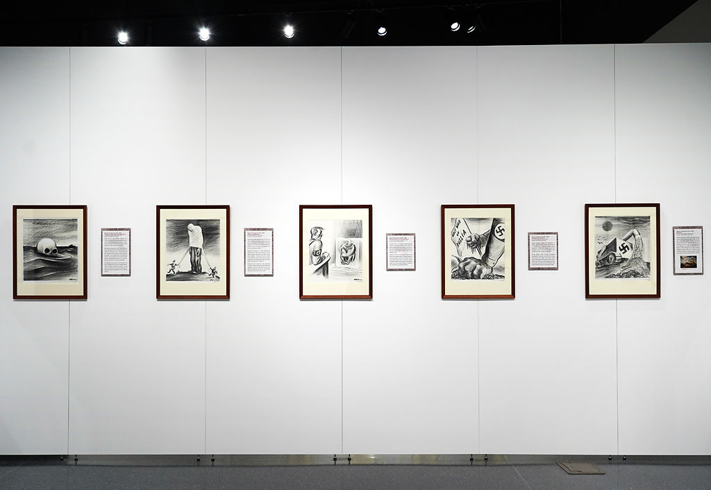 Artwork is displayed at the Thomas Hart Benton Exhibit
